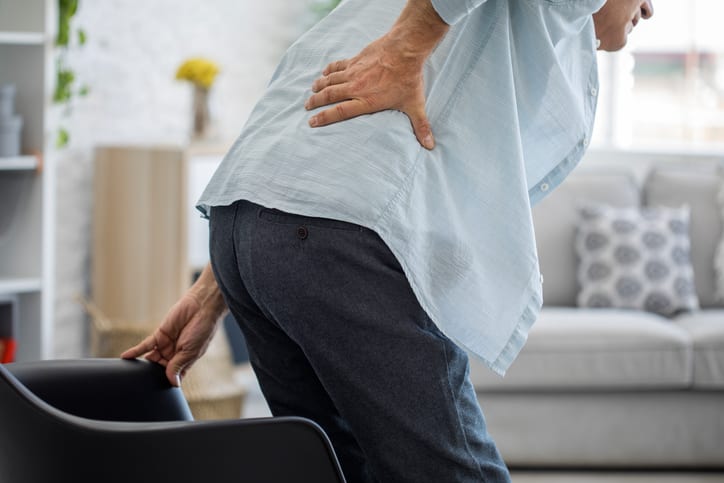 https-www-searcylaw-com-wp-content-uploads-2014-04-man-with-lower-back-pain-jpg