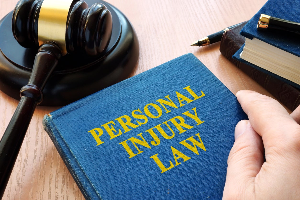 https-www-searcylaw-com-wp-content-uploads-2019-08-personal-injury-law-book-with-gavel-min-jpg