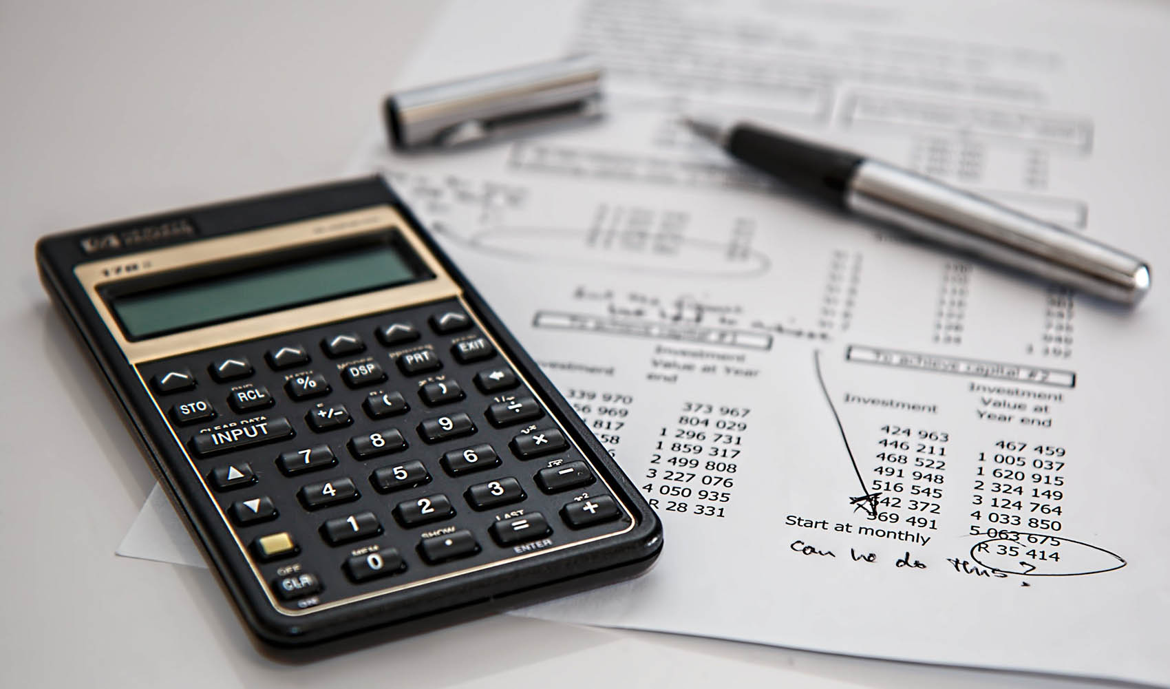 624b2151cb4dcb0fd28a1ae0_calculator-calculation-insurance-finance-53621-1