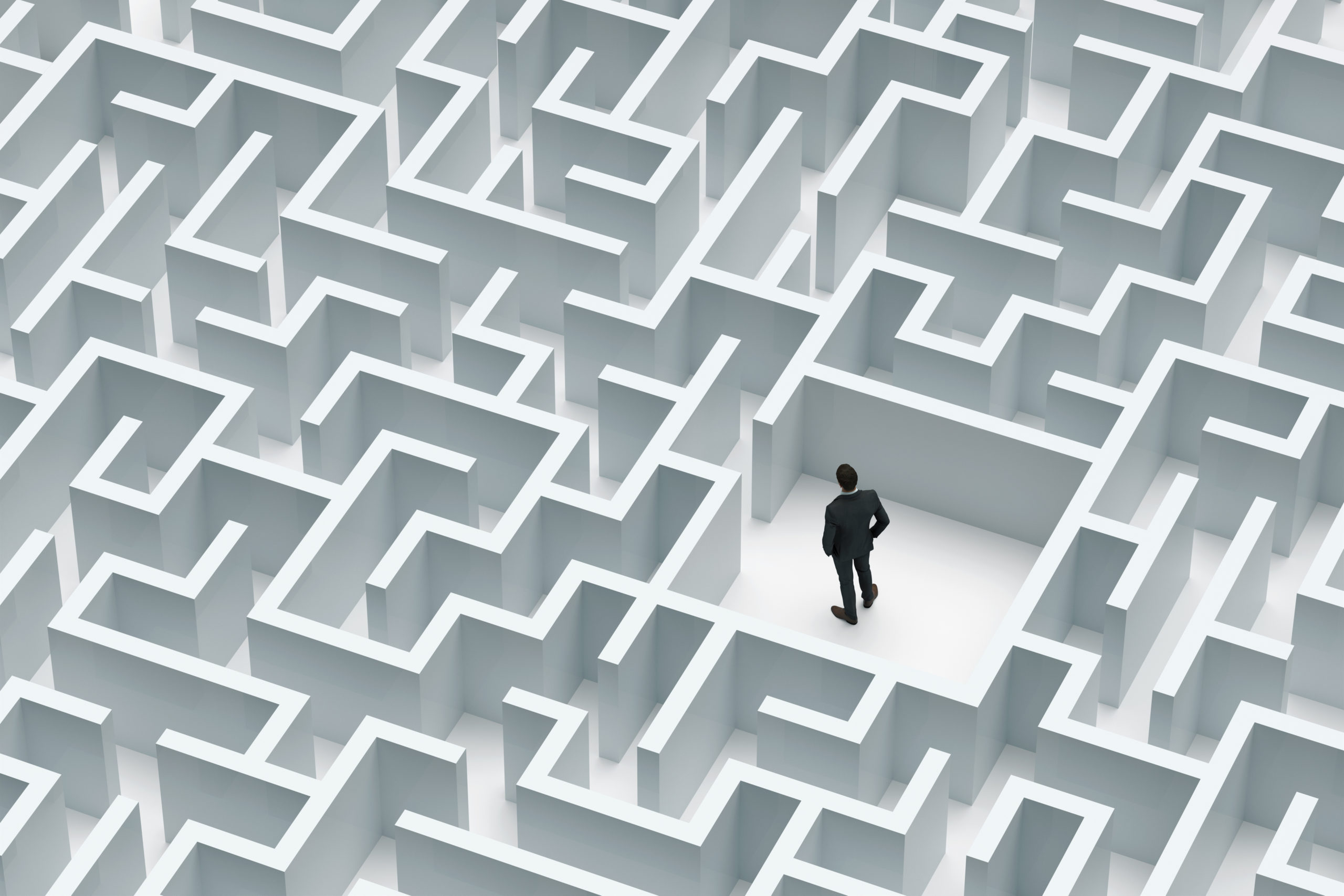Businessman at the center of labyrinth