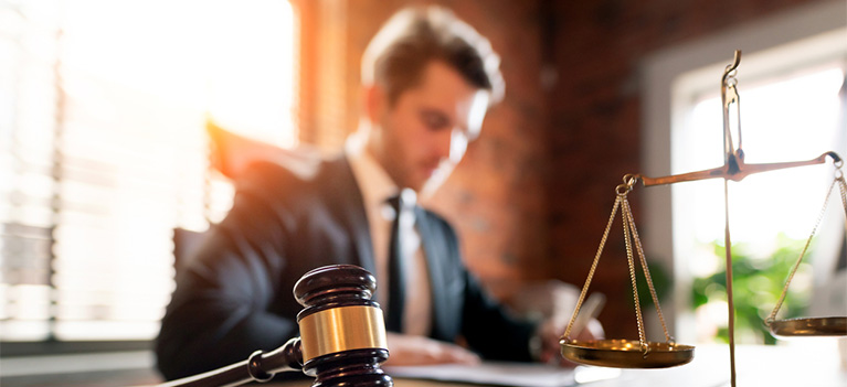 https-www-searcylaw-com-wp-content-uploads-2020-10-lawyer-desk-jpg
