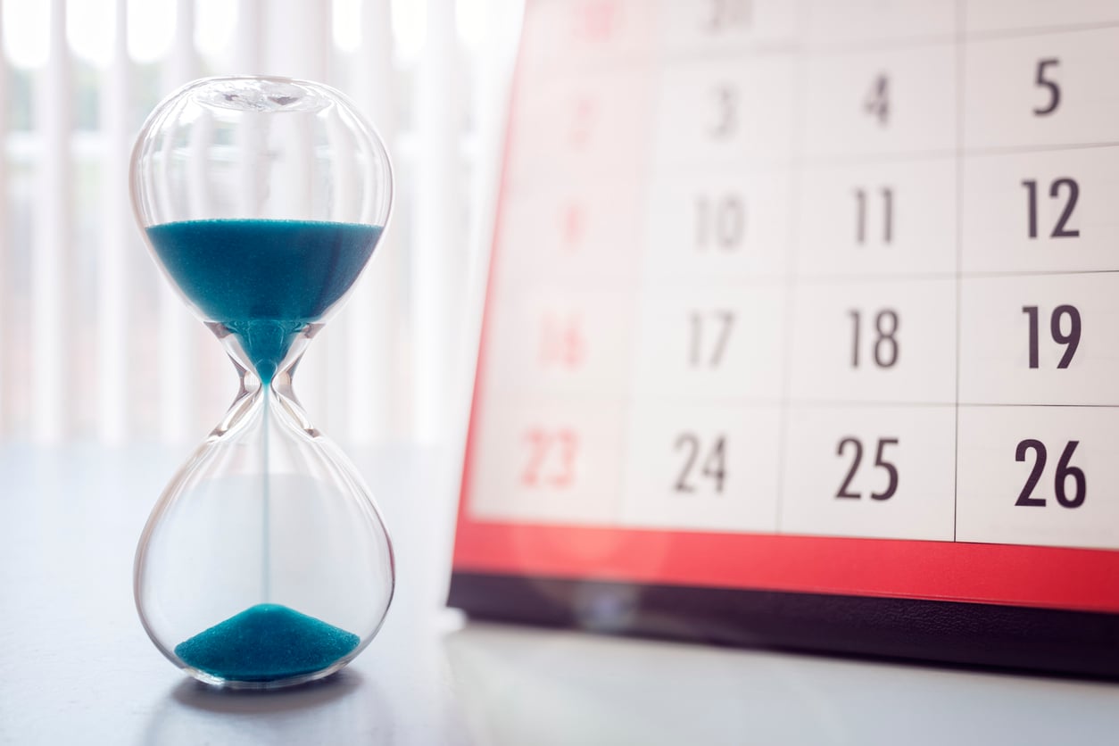 Hour glass and calendar important appointment date, schedule and deadline