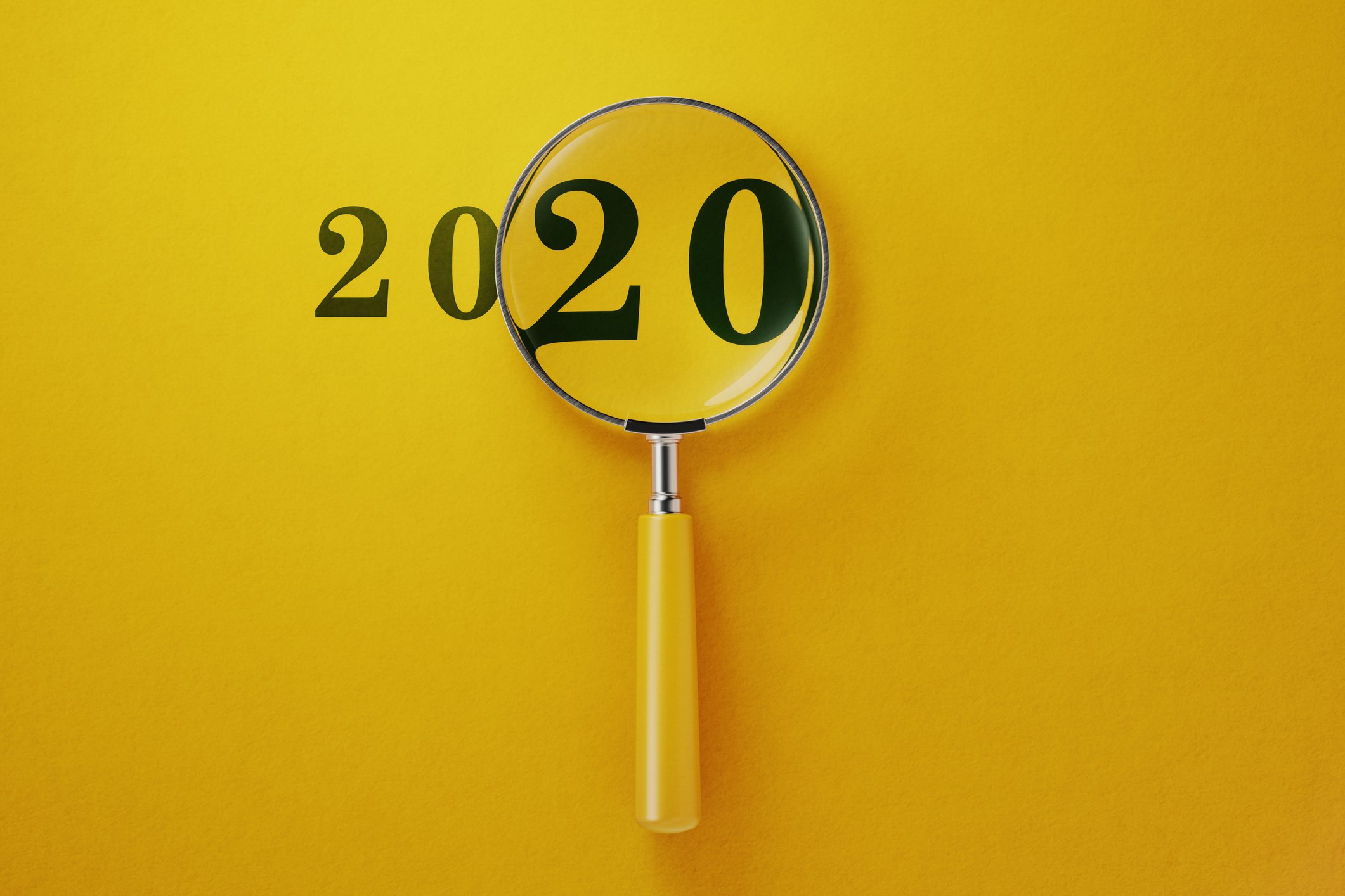 Magnifier And 2020 On Yellow Background