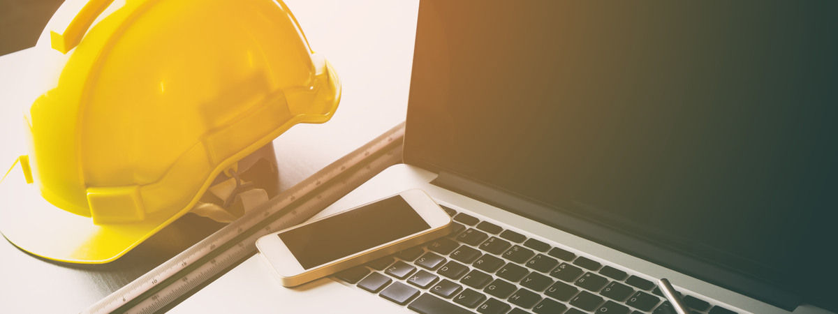 Construction office engineer tablet with computer and smartphone