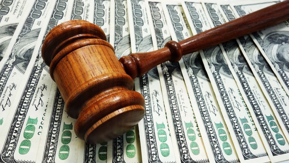 https-blog-goosmannlaw-com-hubfs-gavel%20and%20cash-jpg