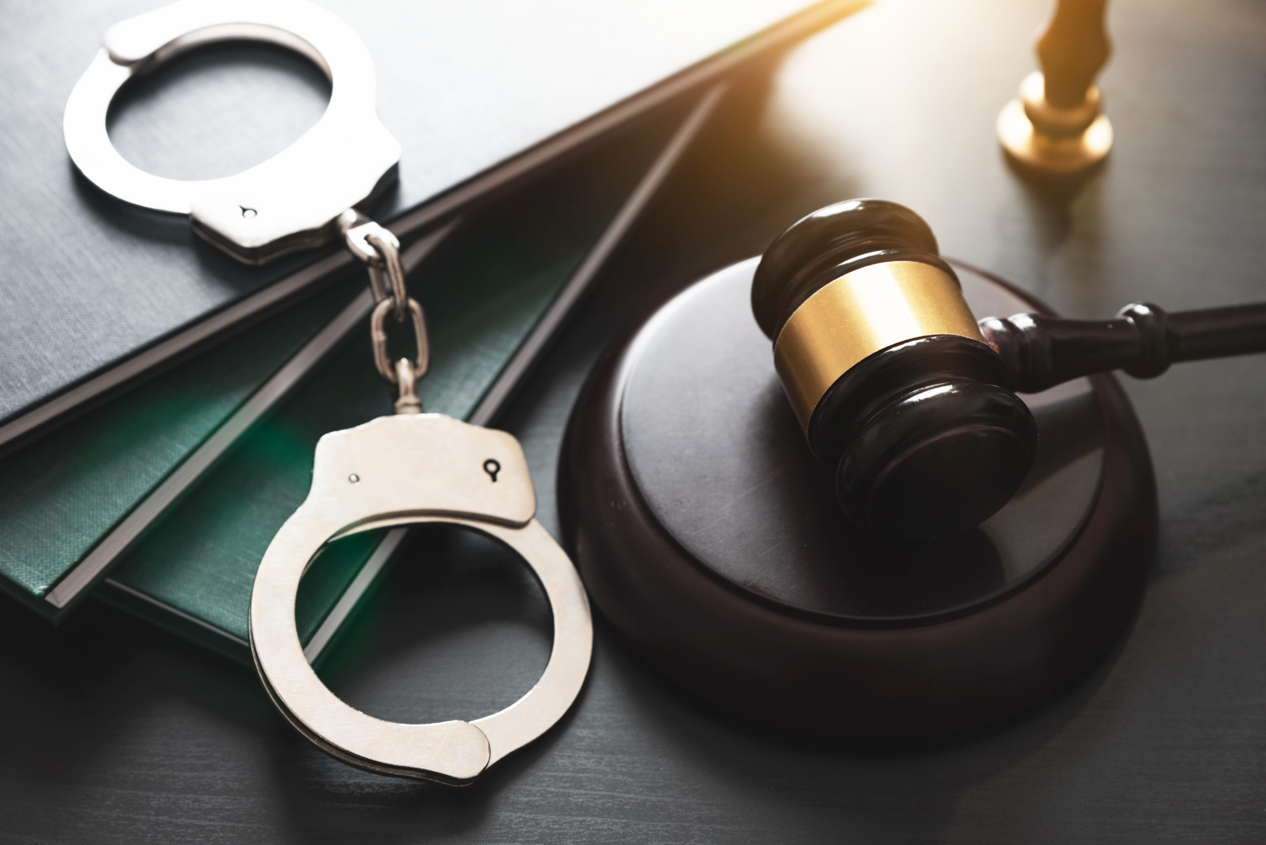 handcuffs-gavel-white-collar-crime-shutterstock_1885320832