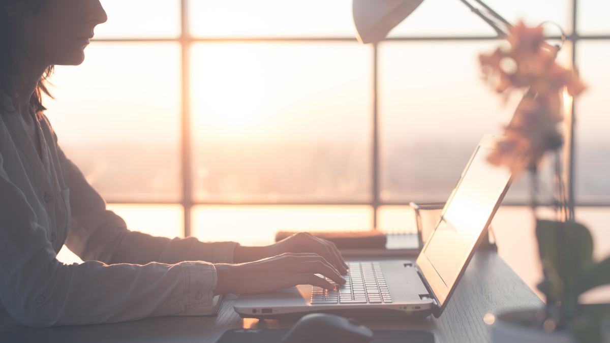 Business_WomanWorkingOnLaptop_1200x675