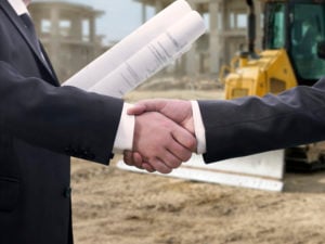 https-www-buildsmartbradley-com-wp-content-uploads-sites-34-2021-02-construction-site-contract-handshake-agreement_gettyimages-626546126-300x225-jpg