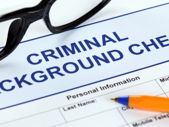 Criminal_background_check_form_glasses_pen_1200