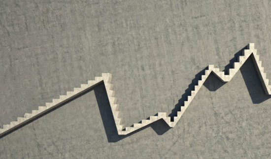 Businessman walks on graph
