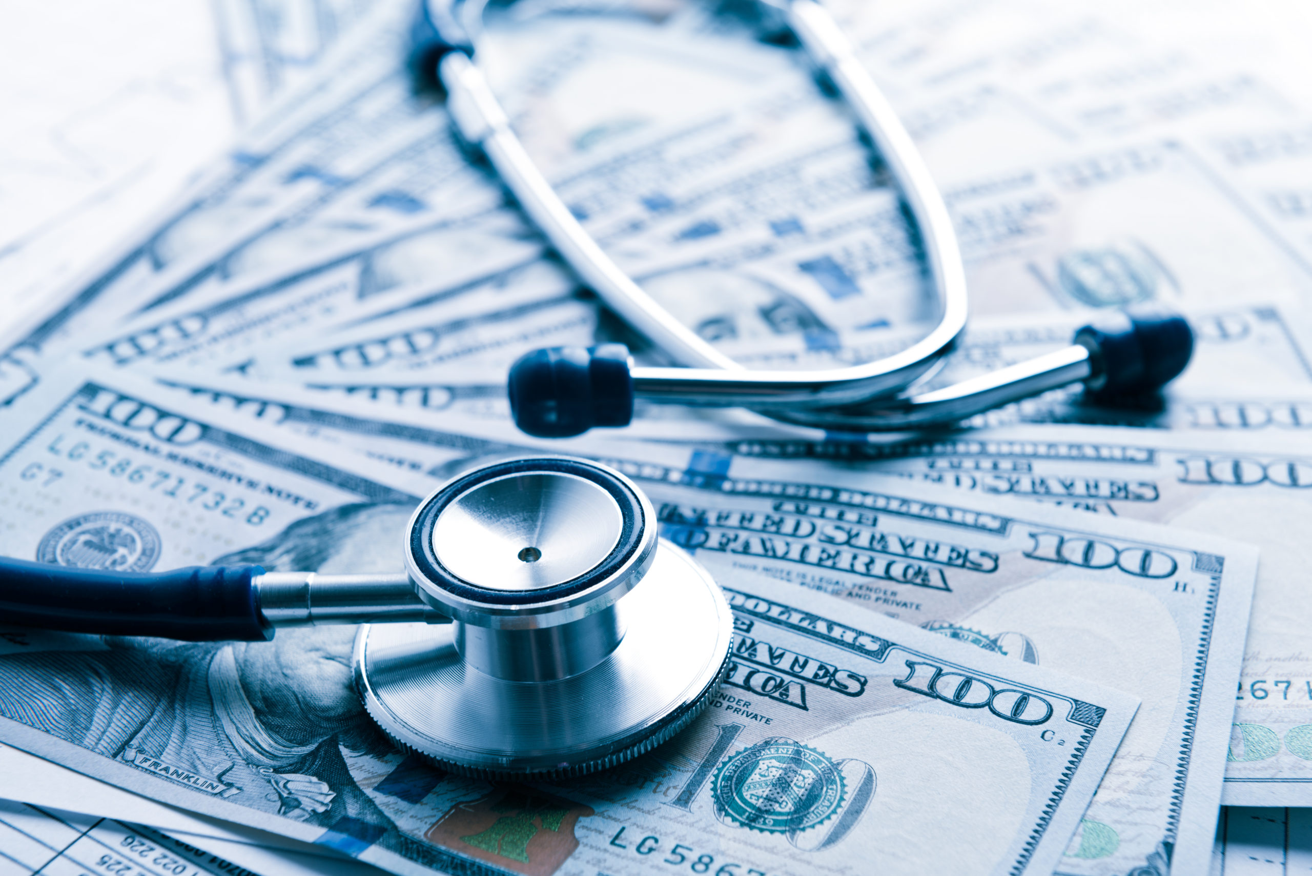 health-cost-money-cash-insurance-blue-shutterstock_383154076