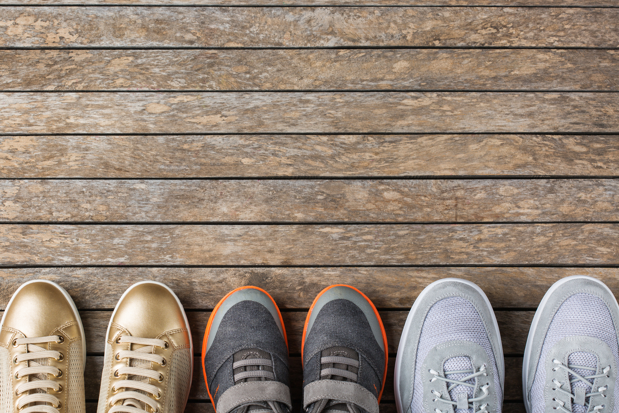 Family, parents and kids concept. Shoes for mother, father, kid