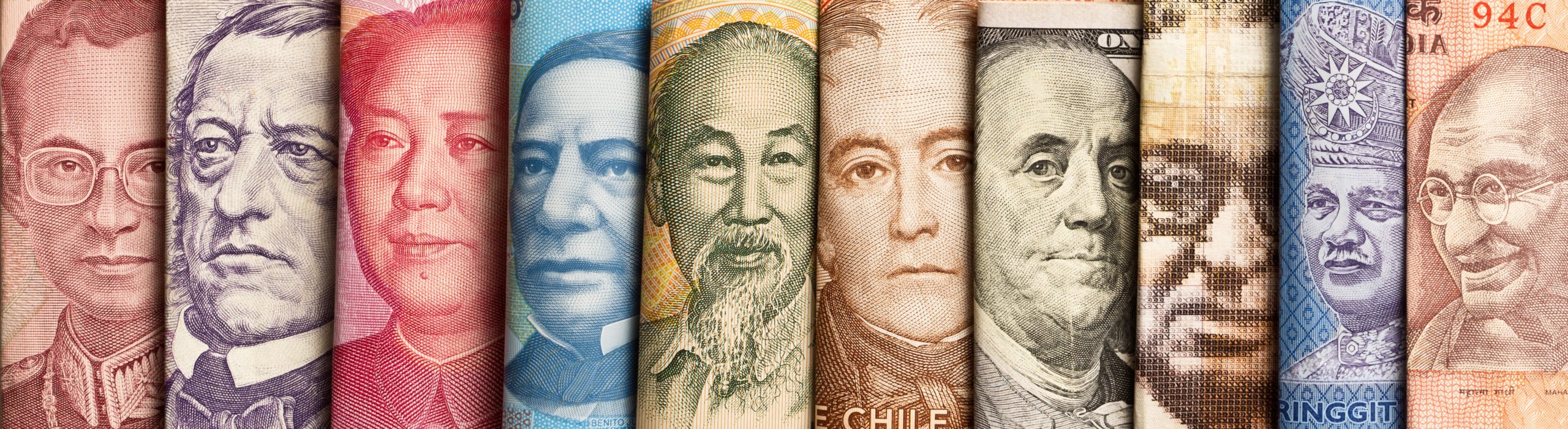 Various International Currency with World Leaders Portraits