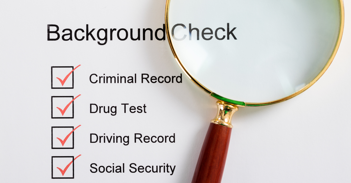 Magnifying_Glass_Over_Background_Check_Form_1200