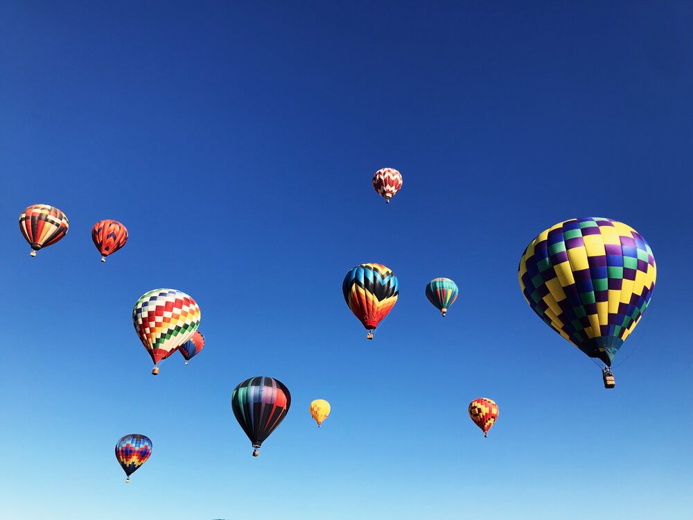 hot air balloons under blue sky during daytime.jpg