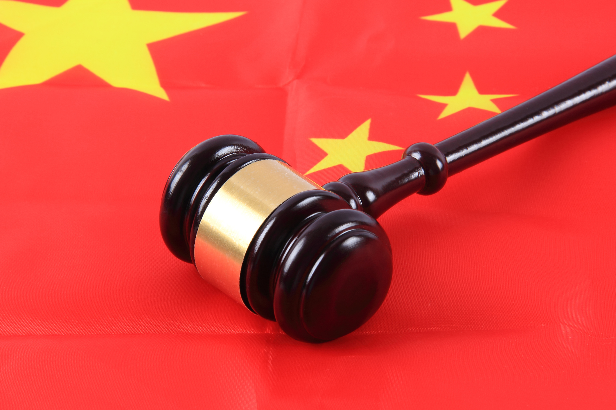 Gavel on Chinese flag, Chinese law