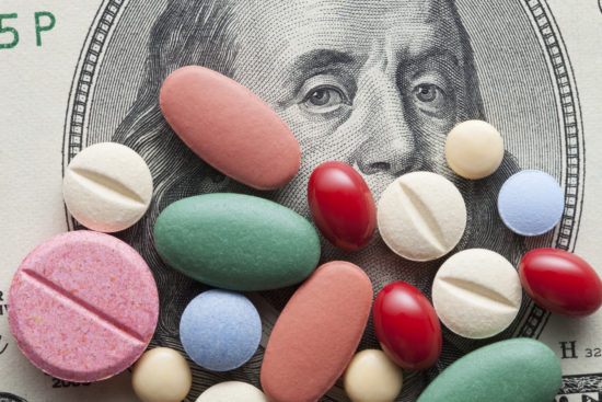 Cost of Healthcare. Pills on US dollars.