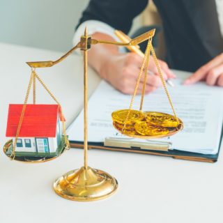 buying real estate with bitcoin