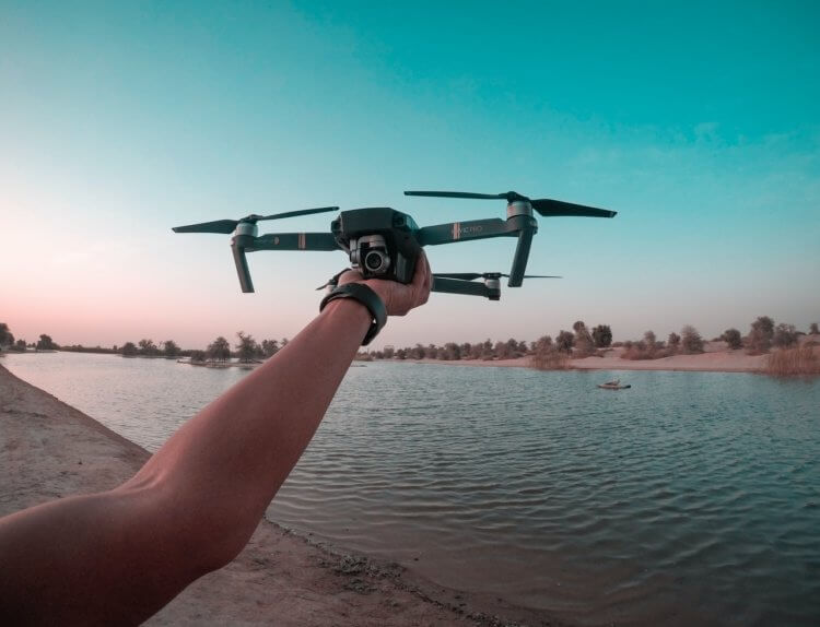 pexels-the-lazy-artist-gallery-1506991 person launching a drone