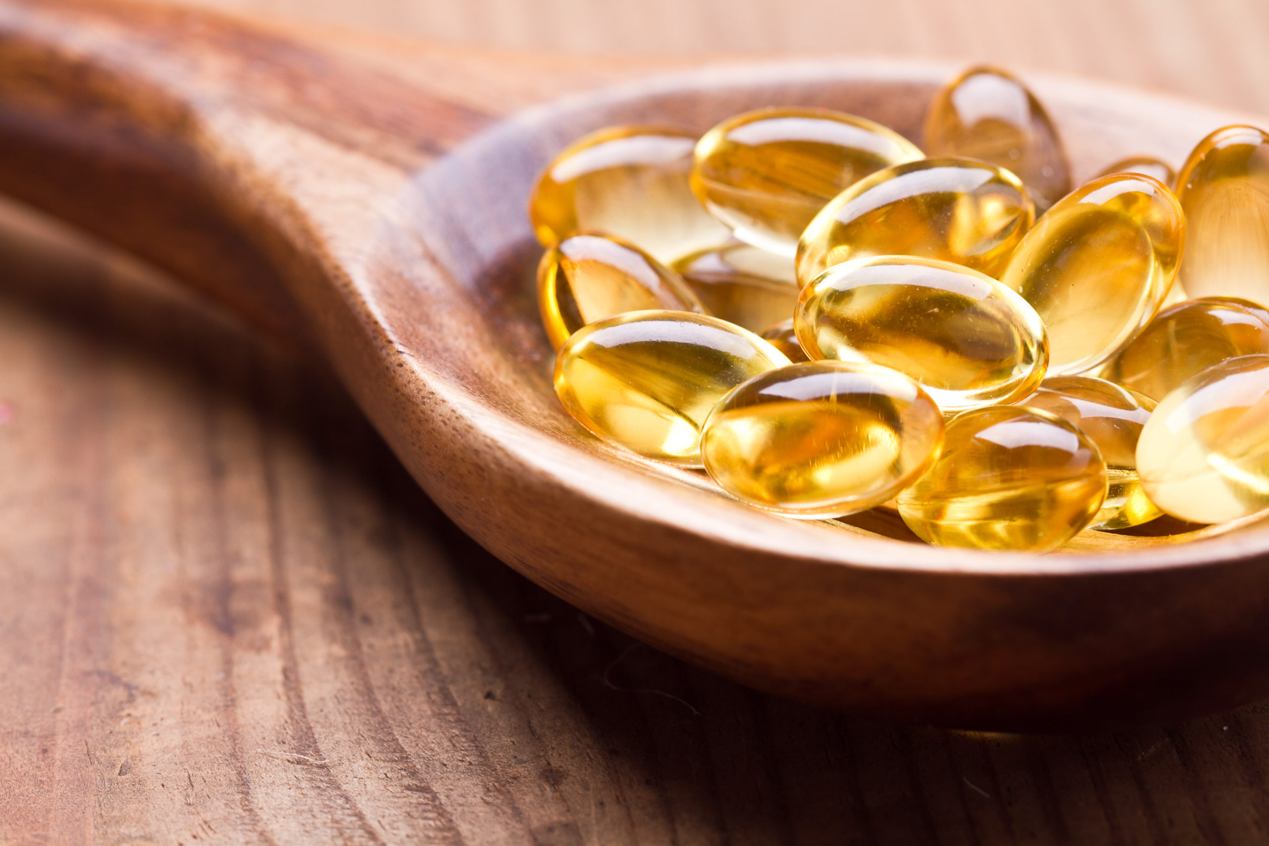 Cod,Liver,Oil,Omega,3,Gel,Capsules,Isolated,On,Wooden