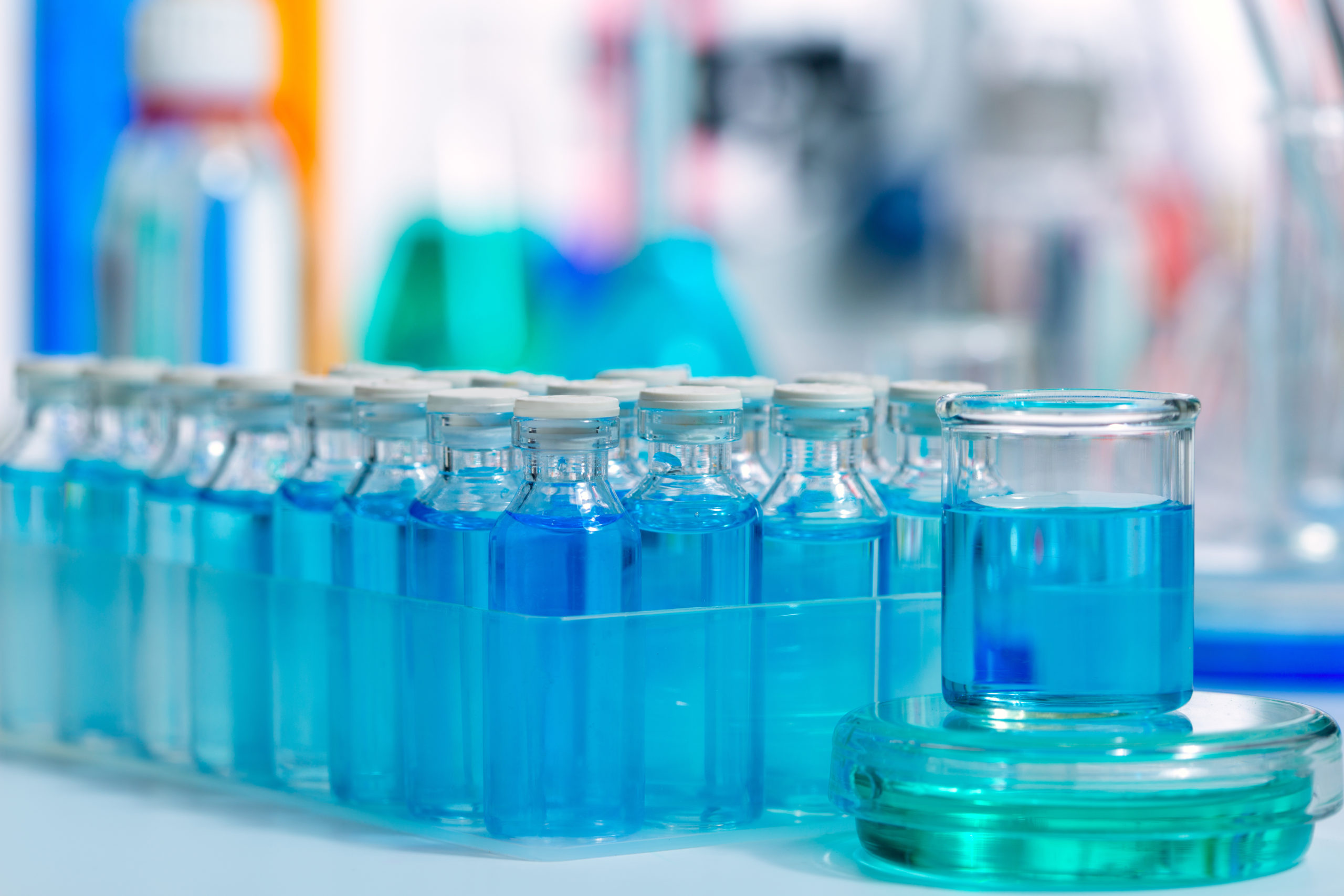 Biotechnology_Chemical scientific laboratory stuff test tube and blue glass bottles