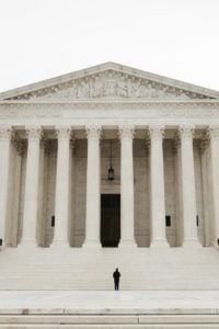 https-www-whitecollarbriefly-com-wp-content-uploads-sites-34-2021-09-supreme-court-of-the-united-states-of-america-picture-id1298974229-200x300-jpg
