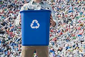 Man-holding-recycling-bin