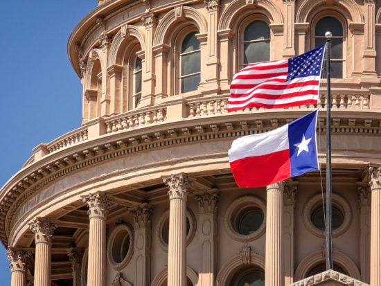 Texas_Austin capital with US and TX flag