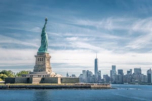 https-www-employmentlawworldview-com-wp-content-uploads-sites-13-2021-12-the-statue-of-liberty-and-manhattan_-new-york-jpg