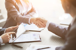 Business people shaking hands