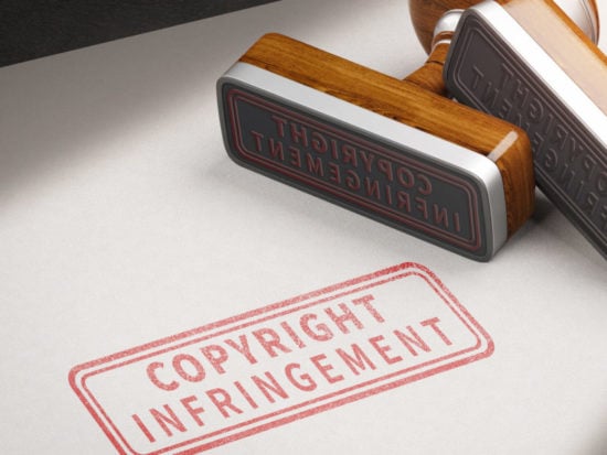 Copyright infringement letters and rubber stamps. 3d illustration