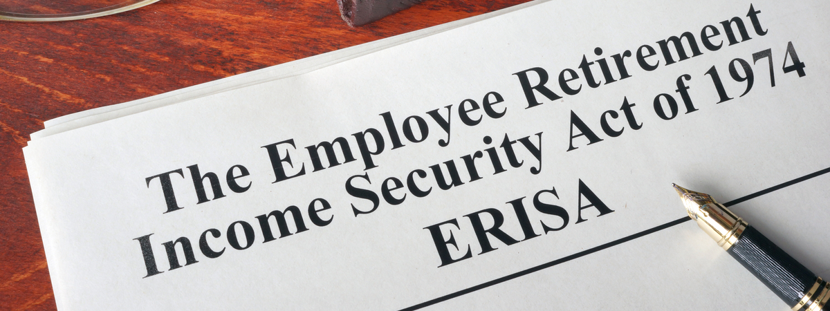 ERISA The Employee Retirement Income Security Act of 1974 on a table.
