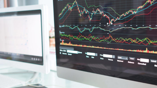 Stock market graph and office work