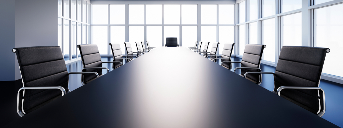 Meeting room in high-rise building with a view at the skyline - 3D illustration-shutterstock_1450471400