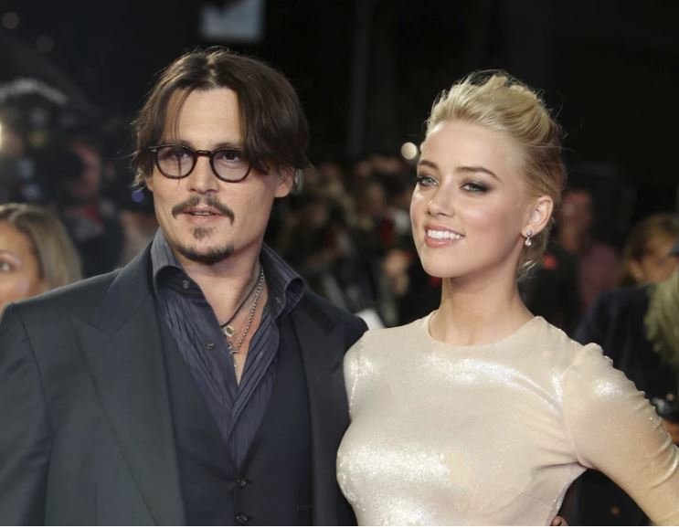 Johnny Depp, left, and Amber Heard arrive for the European premiere of their film “The Rum Diary” in London in 2011.