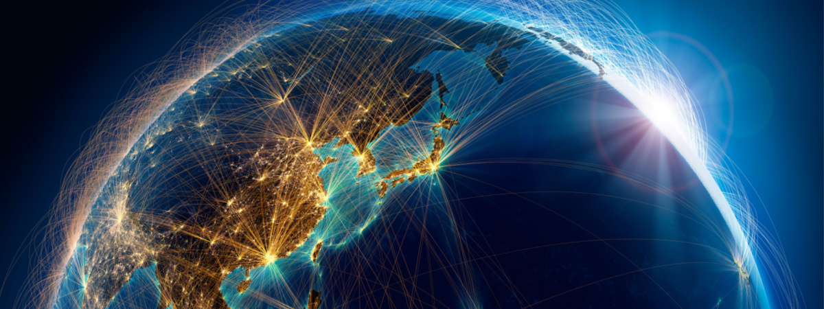 Planet Earth with detailed relief is covered with a complex luminous network of air routes based on real data. Pacific Ocean. Japan, China-Shutterstock_1112579363