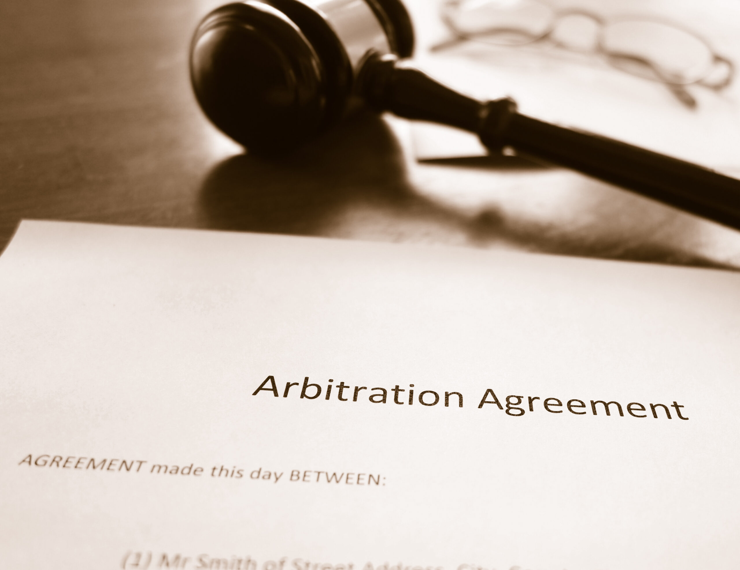 arbitration agreement and court gavel
