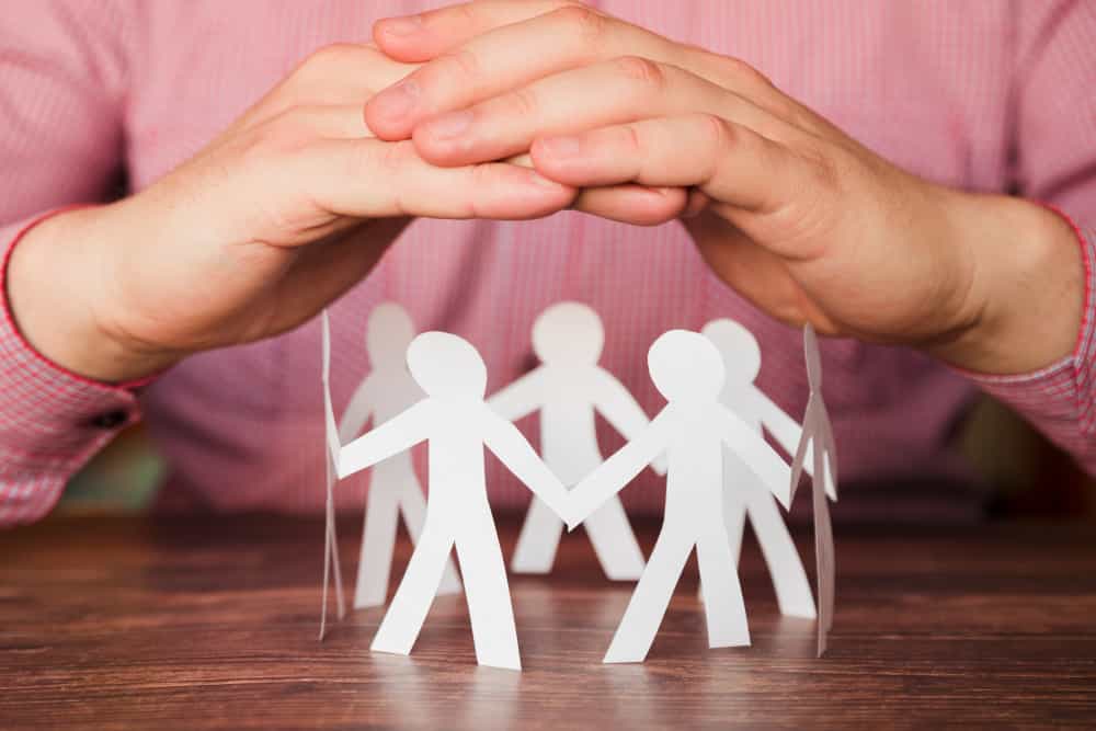 Antitrust Law General connected circle paper people min - Antitrust Law in General