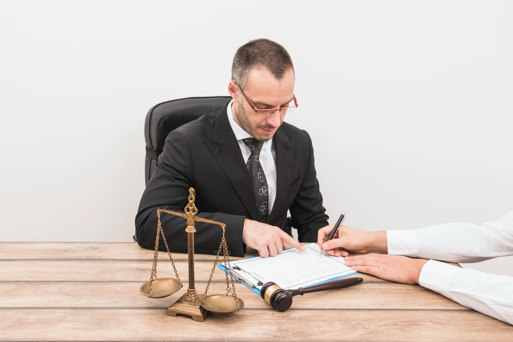 Sue Someone Commercial and Business Law lawyer with client min - Sue Someone in Commercial and Business Law