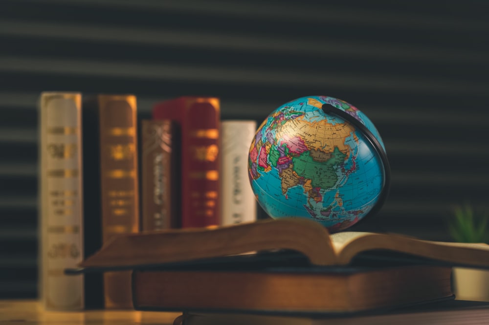 sue someone for legal disputes General A globe and law books symbolizing sue someone for legal disputes abroad