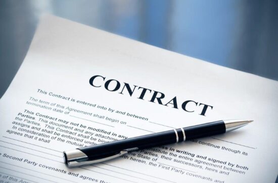 Corporate_Pen on the contract papers