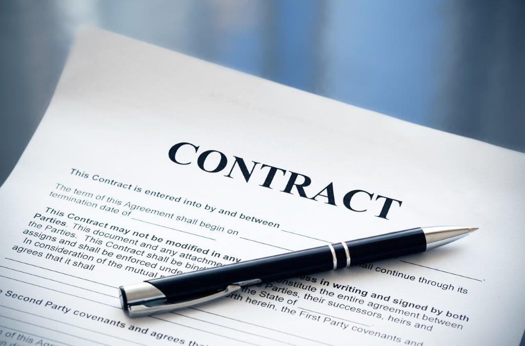 Corporate_Pen on the contract papers
