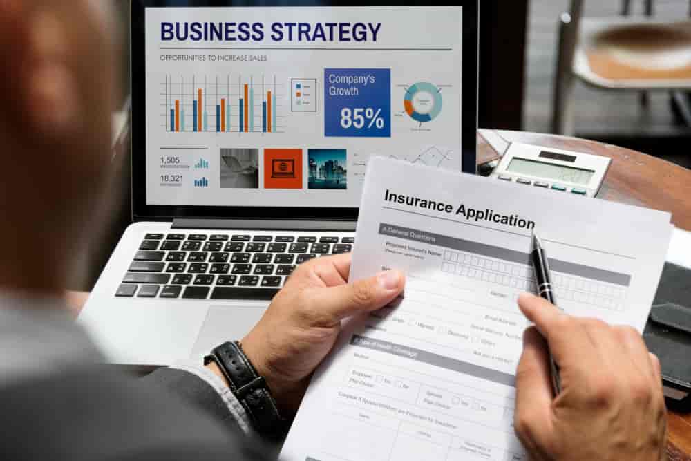 Compulsory insurance for international traders Commercial and Business Law A lawyer examining the compulsory insurance for international traders