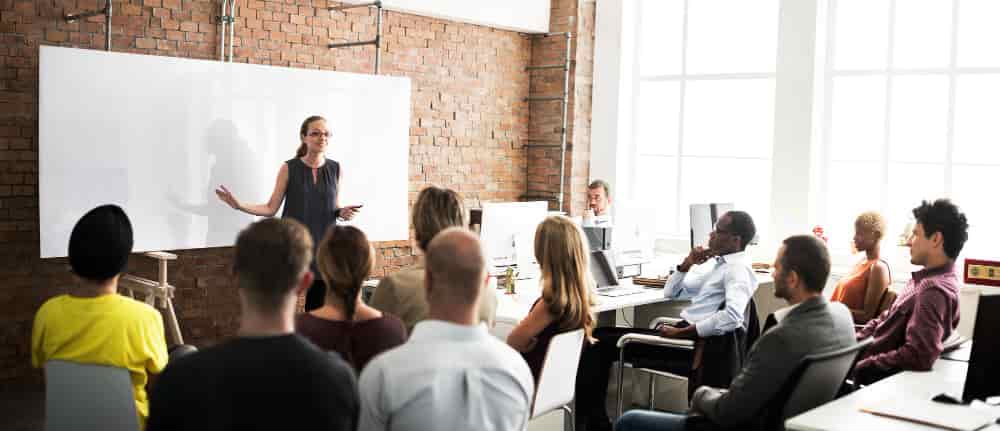 Compliance Challenges for Law Firms Commercial and Business Law A experienced giving compliance training to the lawyers