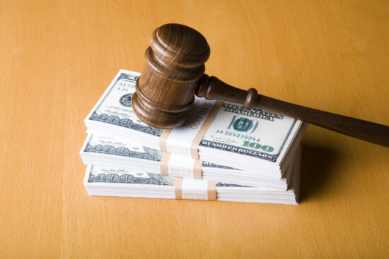 Judge gavel on US dollars