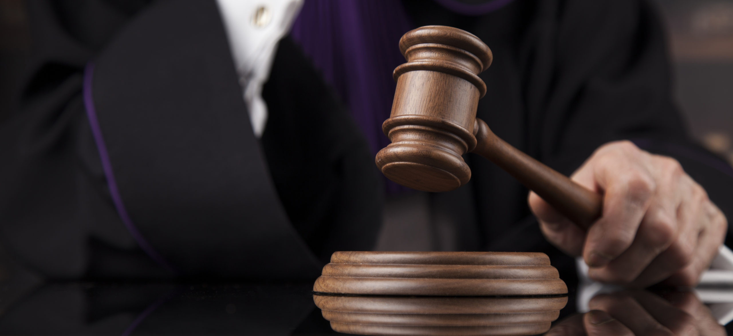 Courtroom,,Judge,,Male,Judge,In,Black,Mirror,Background