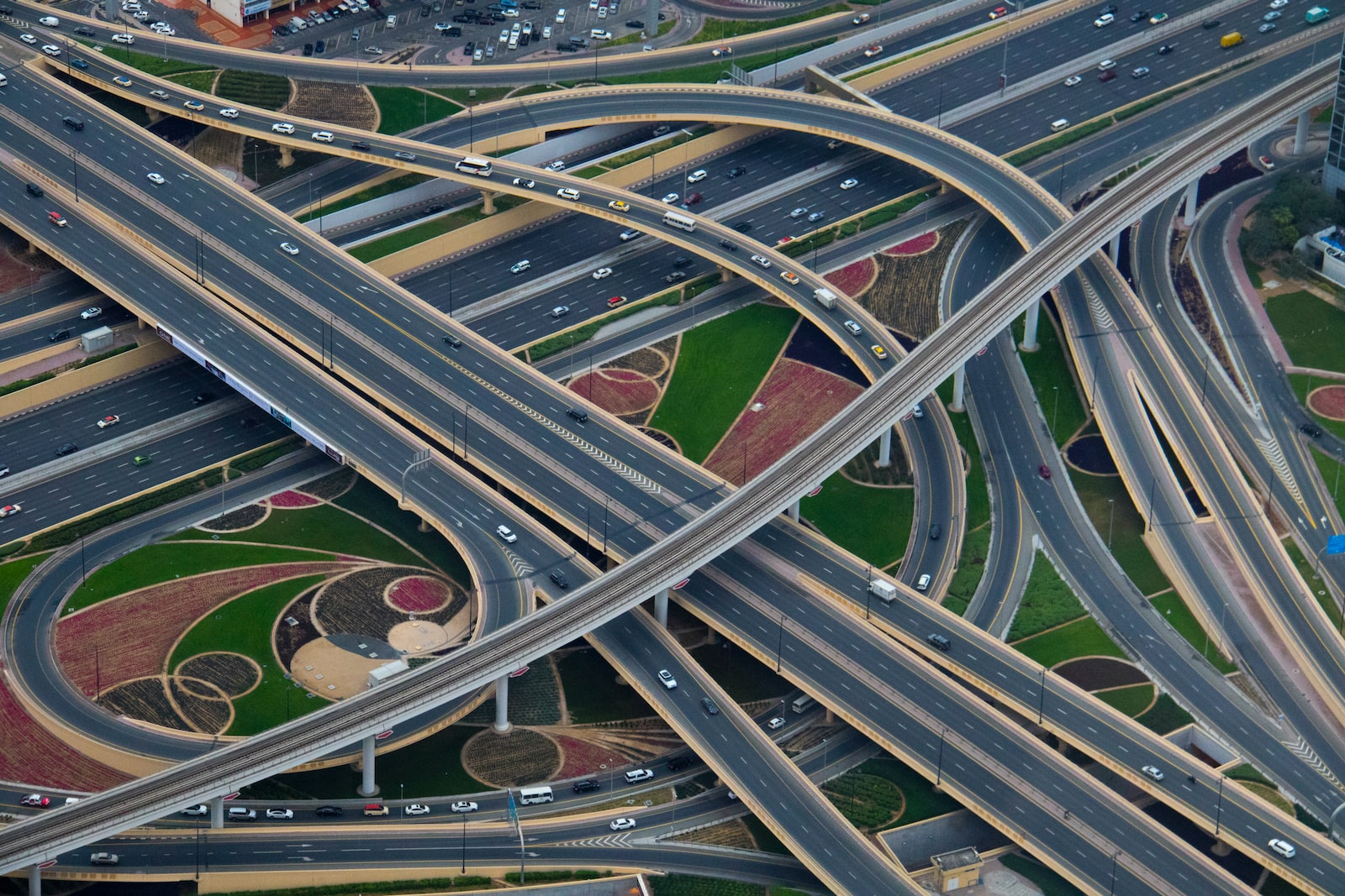I was on vacation in Dubai last week and went to the top of the Burj Khalifa, the tallest building in the world at just over half a mile high.  I looked down and took this photo of the road network around it.  Absolutely mind-boggling how they construct all these huge roads and networks.
