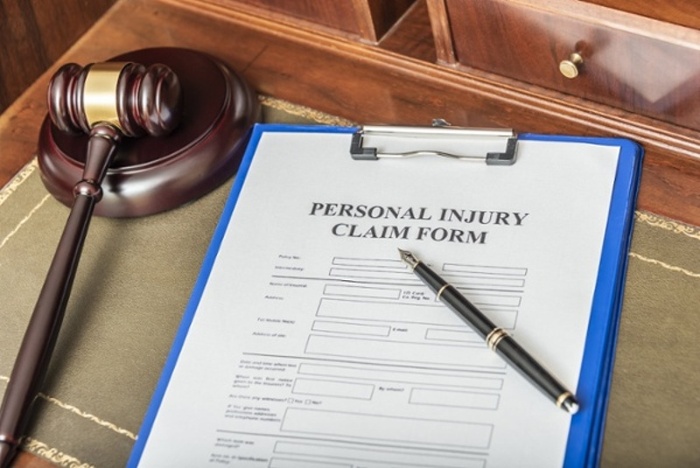 Personal injury form on a clipboard