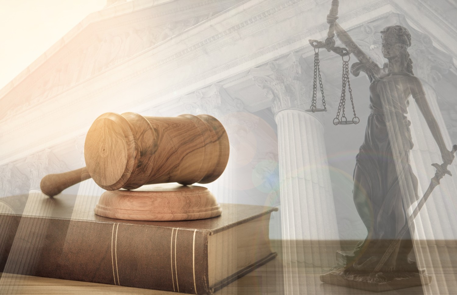 law legal justice Judge gavel on law books with statue of justice and court government
