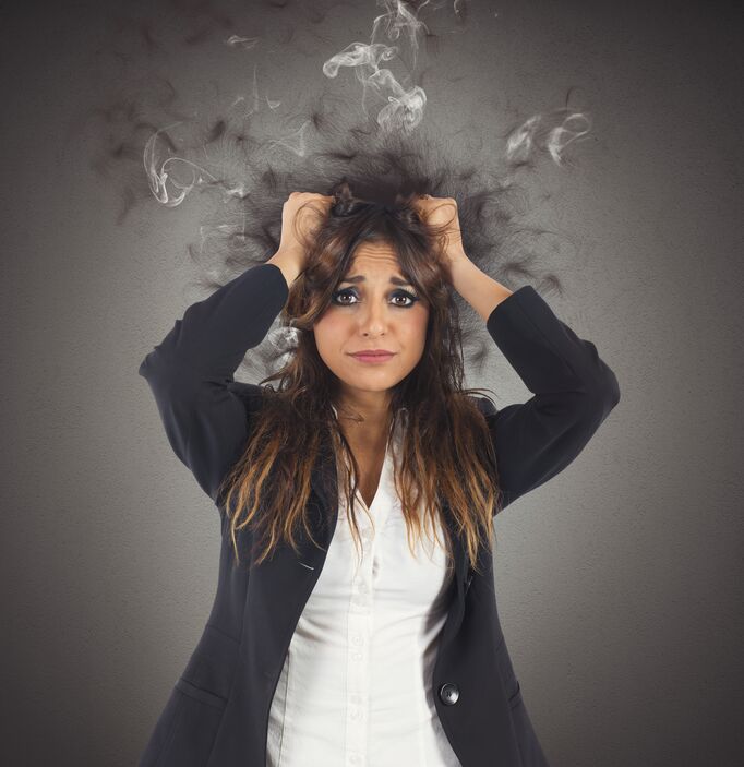 Stressed and desperate businesswoman